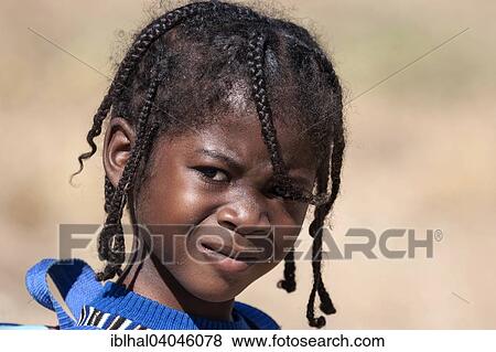 "Local girl with pigtails, portrait, Katutura Township, Windhoek, Namibia, Africa" View Large Photo Image Stock Photo - "Local girl with pigtails, portrait, Katutura Township, Windhoek, Namibia, Africa". Fotosearch