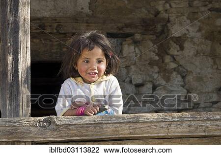 "Local little girl leaning on a wooden pole, Sete, Solukhumbu District, Sagarmatha Zone, Nepal, Asia" View Large Photo Image Stock Image - "Local little girl leaning on a wooden pole, Sete, Solukhumbu District, Sagarmatha Zone, Nepal, Asia". Fotosearch