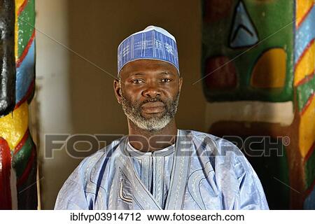 "Local man wearing a traditional Muslim dress, Ngaoundere, Adamawa Region, Cameroon, Africa" View Large Photo Image Stock Image - "Local man wearing a traditional Muslim dress, Ngaoundere, Adamawa Region, Cameroon, Africa". Fotosearch