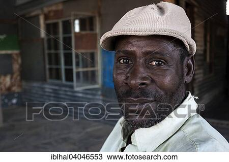 "Local man with a hat, near Khorixas, Namibia, Africa" View Large Photo Image Stock Image - "Local man with a hat, near Khorixas, Namibia, Africa". Fotosearch