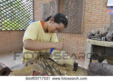 "Local woman carving a Buddha figure, Artisans d'Angkor, Siem Reap, Siem Reap Province, Cambodia, Asia" View Large Photo Image Stock Image - "Local woman carving a Buddha figure, Artisans d'Angkor, Siem Reap, Siem Reap Province, Cambodia, Asia". Fotosearch