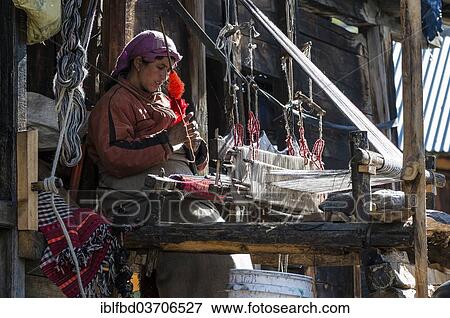 "Local woman weaving with a handloom, Chitkul, Himachal Pradesh, India, Asia" View Large Photo Image Stock Photo - "Local woman weaving with a handloom, Chitkul, Himachal Pradesh, India, Asia". Fotosearch