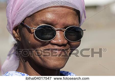 "Local woman with headscarf and sunglasses, portrait, Keetmanshoop, Namibia, Africa" View Large Photo Image Stock Photo - "Local woman with headscarf and sunglasses, portrait, Keetmanshoop, Namibia, Africa". Fotosearch