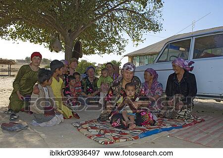 Stock Photo - "Local women and children, Arabbandi, Uzbekistan, Asia". Fotosearch