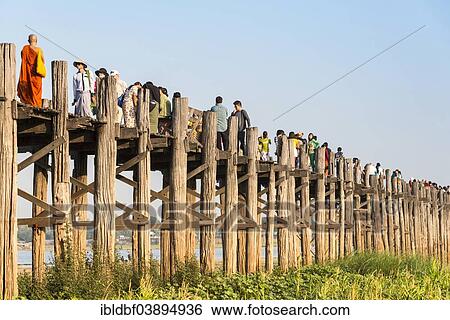 "Locals and tourists on a teak bridge, U Bein Bridge, over Thaungthaman Lake, Amarapura, Mandalay Division, Myanmar, Asia" View Large Photo Image Stock Photograph - "Locals and tourists on a teak bridge, U Bein Bridge, over Thaungthaman Lake, Amarapura, Mandalay Division, Myanmar, Asia". Fotosearch