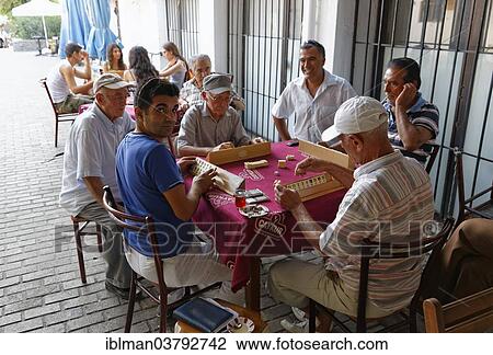 Stock Image - "Locals playing the game Okey, Bodrum, Mugla Province, Aegean, Turkey, Asia". Fotosearch