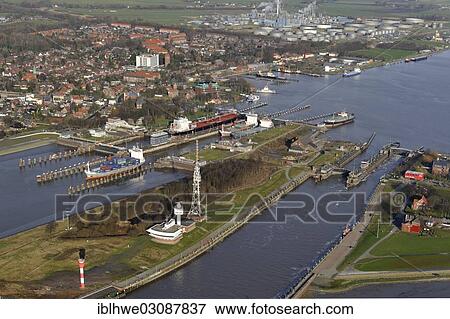 "Lock of the Kiel Canal, German: Nord-Ostsee-Kanal, NOK, aerial photo, Brunsbuttel, Schleswig-Holstein, Germany, Europe" View Large Photo Image Stock Photo - "Lock of the Kiel Canal, German: Nord-Ostsee-Kanal, NOK, aerial photo, Brunsbuttel, Schleswig-Holstein, Germany, Europe". Fotosearch