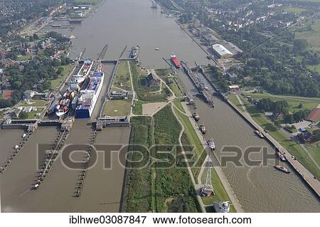 "Lock of the Kiel Canal, German: Nord-Ostsee-Kanal, NOK, aerial photo, Brunsbuttel, Schleswig-Holstein, Germany, Europe" View Large Photo Image Stock Photo - "Lock of the Kiel Canal, German: Nord-Ostsee-Kanal, NOK, aerial photo, Brunsbuttel, Schleswig-Holstein, Germany, Europe". Fotosearch