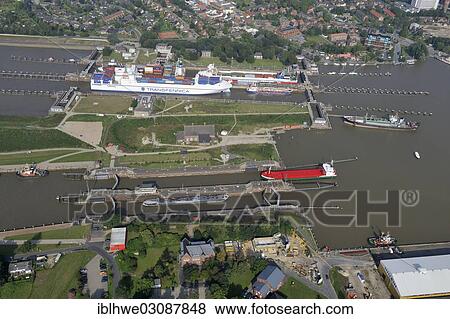"Lock of the Kiel Canal, German: Nord-Ostsee-Kanal, NOK, aerial photo, Brunsbuttel, Schleswig-Holstein, Germany, Europe" View Large Photo Image Stock Photo - "Lock of the Kiel Canal, German: Nord-Ostsee-Kanal, NOK, aerial photo, Brunsbuttel, Schleswig-Holstein, Germany, Europe". Fotosearch