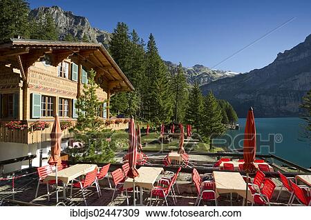 "Log chalet and inn at Oeschinensee, Oeschinen Lake, Bernese Oberland, Canton of Bern, Switzerland, Europe" View Large Photo Image Stock Photo - "Log chalet and inn at Oeschinensee, Oeschinen Lake, Bernese Oberland, Canton of Bern, Switzerland, Europe". Fotosearch