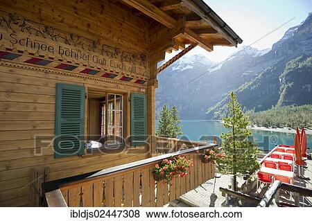 "Log chalet at Oeschinensee, Oeschinen Lake, Bernese Oberland, Canton of Bern, Switzerland, Europe" View Large Photo Image Stock Photo - "Log chalet at Oeschinensee, Oeschinen Lake, Bernese Oberland, Canton of Bern, Switzerland, Europe". Fotosearch