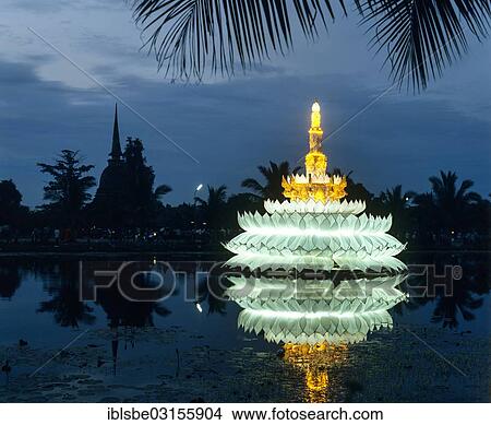 Picture - "Loi Krathong festival, giant Krathong in the lotus pond, chedi of Wat Sra Si, Sukhothai Historical Park, at dusk, Sukhothai, Sukhothai Province, Northern Thailand, Thailand, Asia". Fotosearch