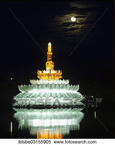 "Loi Krathong festival, giant Krathong in the pond, full moon, Sukhothai Historical Park, at night, Sukhothai, Sukhothai Province, Northern Thailand, Thailand, Asia" View Large Photo Image Stock Photography - "Loi Krathong festival, giant Krathong in the pond, full moon, Sukhothai Historical Park, at night, Sukhothai, Sukhothai Province, Northern Thailand, Thailand, Asia". Fotosearch