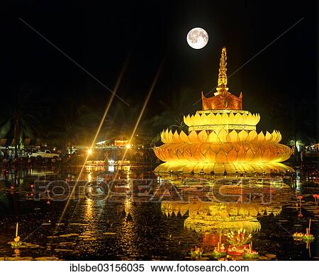 Stock Photography - "Loi Krathong festival, giant Krathong in the pond, full moon, Sukhothai Historical Park, at night, Sukhothai, Sukhothai Province, Northern Thailand, Thailand, Asia". Fotosearch