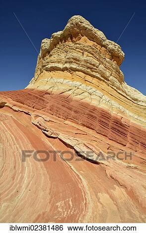 Stock Photograph - "Lollipop Rock, Brain Rocks at White Pocket, eroded Navajo sandstone rocks with Liesegang bands or Liesegang rings, Pareah Paria Plateau, Vermillion Cliffs National Monument, Arizona, Utah, Southwestern USA, USA". Fotosearch