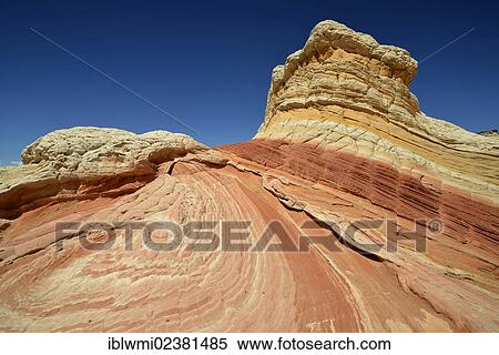 Stock Photography - "Lollipop Rock, Brain Rocks at White Pocket, eroded Navajo sandstone rocks with Liesegang bands or Liesegang rings, Pareah Paria Plateau, Vermillion Cliffs National Monument, Arizona, Utah, Southwestern USA, USA". Fotosearch