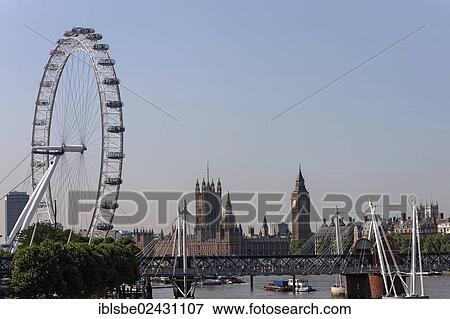 Stock Photo - "London Eye Ferris wheel, Big Ben, Westminster Palace, London, England, United Kingdom, Europe". Fotosearch