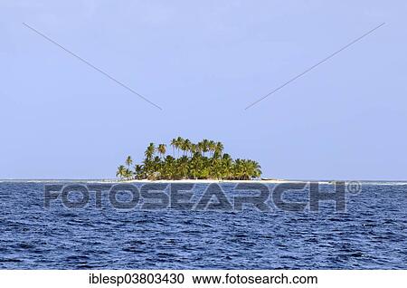 Stock Image - "Lonely island with palm trees, Lemon Cays, San Blas Islands, Caribbean, Panama, North America". Fotosearch