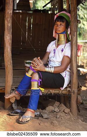"Long-necked Padaung woman wearing neck rings, hill tribes, Chiang Rai, Northern Thailand, Thailand, Asia" View Large Photo Image Stock Photo - "Long-necked Padaung woman wearing neck rings, hill tribes, Chiang Rai, Northern Thailand, Thailand, Asia". Fotosearch