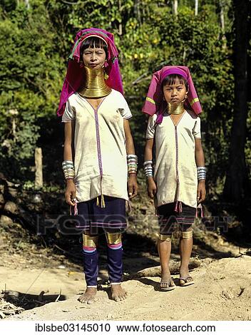 "Long-necked woman and a girl of the Padaung mountain tribe, also known as giraffe women, wearing neck rings, Chiang Rai Province, Northern Thailand, Thailand, Asia" View Large Photo Image Stock Image - "Long-necked woman and a girl of the Padaung mountain tribe, also known as giraffe women, wearing neck rings, Chiang Rai Province, Northern Thailand, Thailand, Asia". Fotosearch