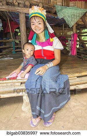 "Long-necked woman with her baby, Karen tribe, Chiang Mai, Thailand, Asia" View Large Photo Image Stock Photo - "Long-necked woman with her baby, Karen tribe, Chiang Mai, Thailand, Asia". Fotosearch
