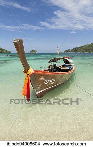 Picture - "Longtail boat at Monkey Beach on Ko Rawi island, Tarutao Marine National Park, Thailand, Asia". Fotosearch