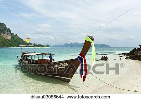 "Longtail boat on a beach, Insel Tup, Ao Nang, Krabi Province, Southern Thailand, Thailand, Asia" View Large Photo Image Picture - "Longtail boat on a beach, Insel Tup, Ao Nang, Krabi Province, Southern Thailand, Thailand, Asia". Fotosearch