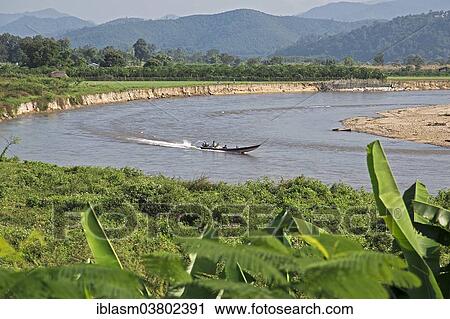 "Longtail boat on the Maenam Kok River, near Mae Ai, Province of Chiang Rai, Thailand, Asia" View Large Photo Image Stock Image - "Longtail boat on the Maenam Kok River, near Mae Ai, Province of Chiang Rai, Thailand, Asia". Fotosearch