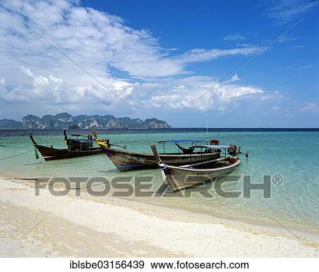 Stock Photo - "Longtail boats at Phra Nang Beach, Rai Leh, Krabi, Sudthailand, Thailand, Asia". Fotosearch