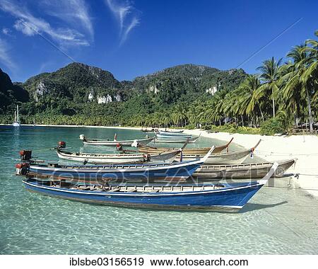 "Longtail boats at the beach, Ton Sai Beach, Ko Phi Phi Don, Phi Phi Islands, Krabi Province, Southern Thailand, Thailand, Asia" View Large Photo Image Stock Photo - "Longtail boats at the beach, Ton Sai Beach, Ko Phi Phi Don, Phi Phi Islands, Krabi Province, Southern Thailand, Thailand, Asia". Fotosearch