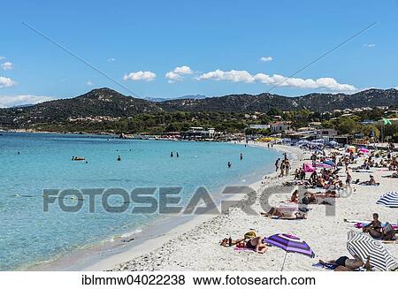 Stock Photo - "Loria beach with bathers, Lâ€™Ile-Rousse, Corsica, France, Europe". Fotosearch