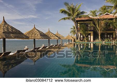 "Lotus Village Resort, parasols by the pool, M??i Ne, Sudostasien, Vietnam, Asia" View Large Photo Image Stock Image - "Lotus Village Resort, parasols by the pool, M??i Ne, Sudostasien, Vietnam, Asia". Fotosearch