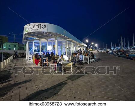 "Lounge, bar at the fishing port, Piazza Fonderia, Palermo, Sicily, Italy, Europe" View Large Photo Image Stock Image - "Lounge, bar at the fishing port, Piazza Fonderia, Palermo, Sicily, Italy, Europe". Fotosearch