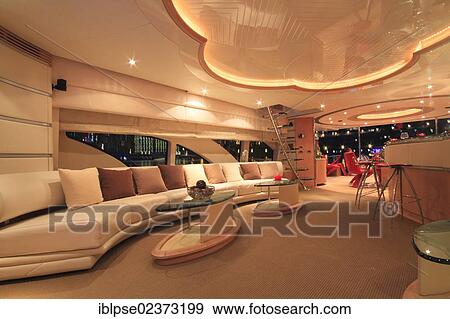 "Lounge on the main deck, Leonardo II, a cruiser built by Azimut, type of boat: Leonardo 98, length: 30. 15 m, built in 2004, French Riviera, France, Mediterranean Sea, Europe" View Large Photo Image Stock Photo - "Lounge on the main deck, Leonardo II, a cruiser built by Azimut, type of boat: Leonardo 98, length: 30. 15 m, built in 2004, French Riviera, France, Mediterranean Sea, Europe". Fotosearch