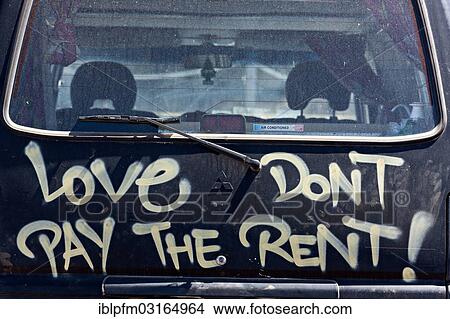 "Love don't pay the rent"""", written on the rear of a motor vehicle, Augusta, Western Australia, Australia, Oceania" View Large Photo Image Picture - "Love don't pay the rent"""", written on the rear of a motor vehicle, Augusta, Western Australia, Australia, Oceania". Fotosearch