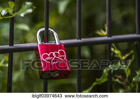 Stock Image - "Love lock on a bridge railing, North Rhine-Westphalia, Germany, Europe". Fotosearch