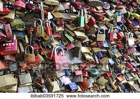 Stock Photography - "Love locks on Hohenzollern Bridge, Cologne, Rhineland, North Rhine-Westphalia, Germany, Europe". Fotosearch