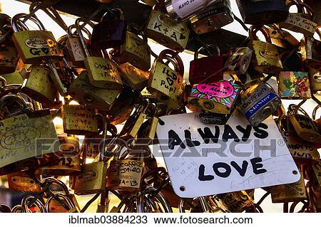 Stock Image - "Love locks on the Pont des Artes bridge, Paris, Ile-de-France, France, Europe". Fotosearch