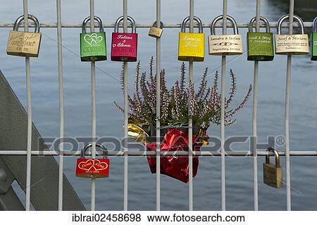 "Lovers' padlocks on the Eiserner Steg, Iron Bridge, Danube, Regensburg, Upper Palatinate, Bavaria, Germany, Europe" View Large Photo Image Stock Photo - "Lovers' padlocks on the Eiserner Steg, Iron Bridge, Danube, Regensburg, Upper Palatinate, Bavaria, Germany, Europe". Fotosearch