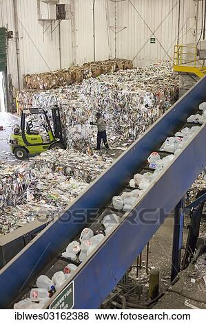 "Low-wage workers sort paper, glass, plastic, and metals for recycling, recycling centre of the Southeastern Oakland County Resource Recovery Authority (SOCRRA), Troy, Michigan, United States, North America" View Large Photo Image Stock Photo - "Low-wage workers sort paper, glass, plastic, and metals for recycling, recycling centre of the Southeastern Oakland County Resource Recovery Authority (SOCRRA), Troy, Michigan, United States, North America". Fotosearch
