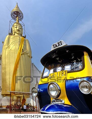 "Luang Pho Tho, 32 m tall Buddha statue of Wat Intharawihan, Wat Indra, tuk tuk, Bangkok, Central Thailand, Thailand, Asia" View Large Photo Image Picture - "Luang Pho Tho, 32 m tall Buddha statue of Wat Intharawihan, Wat Indra, tuk tuk, Bangkok, Central Thailand, Thailand, Asia". Fotosearch