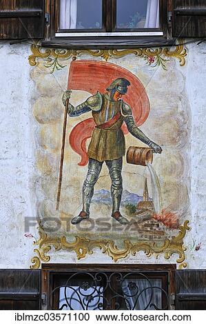 Stock Image - "Lueftlmalerei mural of St. Florian from 1936 on the facade of a farmhouse, Durnbach, Upper Bavaria, Bavaria, Germany, Europe". Fotosearch