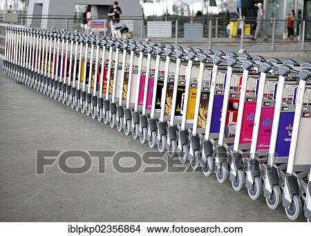 "Luggage carts at the airport in Bangkok, Thailand, Asia" View Large Photo Image Picture - "Luggage carts at the airport in Bangkok, Thailand, Asia". Fotosearch
