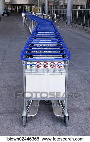 Stock Photo - "Luggage trolleys at the airport, Malaga, Andalusia, Spain, Europe". Fotosearch