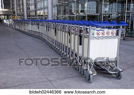 Stock Photograph - "Luggage trolleys at the airport, Malaga, Andalusia, Spain, Europe". Fotosearch