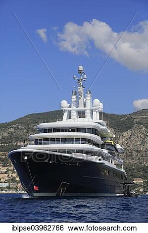 "Luna"""" luxury motor yacht, constructed by LloydWerft shipyard, length 115 m, built in 2010, owner Roman Abramovich, Cote d'Azur, France, Europe" View Large Photo Image Stock Photograph - "Luna"""" luxury motor yacht, constructed by LloydWerft shipyard, length 115 m, built in 2010, owner Roman Abramovich, Cote d'Azur, France, Europe". Fotosearch