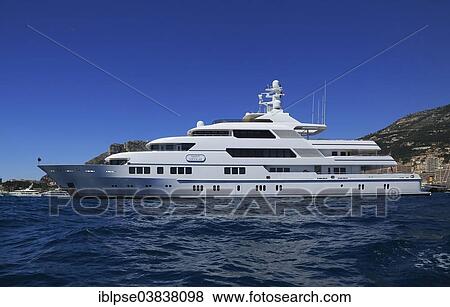 Lurssen motor yacht Saint Nicolas at anchor in front of the Principality of Monaco View Large Photo Image Stock Photo - Lurssen motor yacht Saint Nicolas at anchor in front of the Principality of Monaco. Fotosearch