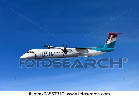 Luxair De Havilland Canada DHC-8-402Q Dash 8 in flight View Large Photo Image Stock Image - Luxair De Havilland Canada DHC-8-402Q Dash 8 in flight. Fotosearch