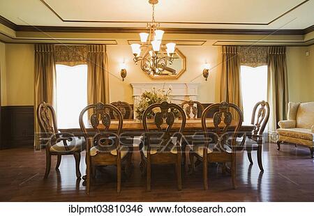 "Luxurious dining room with a wooden table and chairs, Quebec province, Canada, North America" View Large Photo Image Stock Photograph - "Luxurious dining room with a wooden table and chairs, Quebec province, Canada, North America". Fotosearch