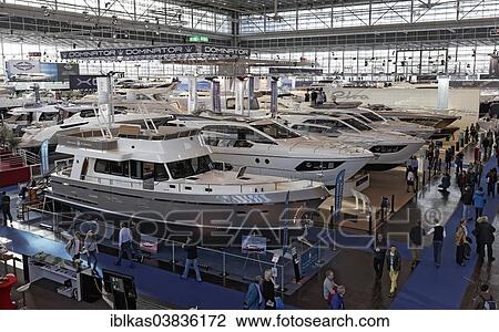 "Luxury motor yachts on display in an exhibition hall, Boot Dusseldorf trade fair, Dusseldorf, North Rhine-Westphalia, Germany, Europe" View Large Photo Image Stock Image - "Luxury motor yachts on display in an exhibition hall, Boot Dusseldorf trade fair, Dusseldorf, North Rhine-Westphalia, Germany, Europe". Fotosearch